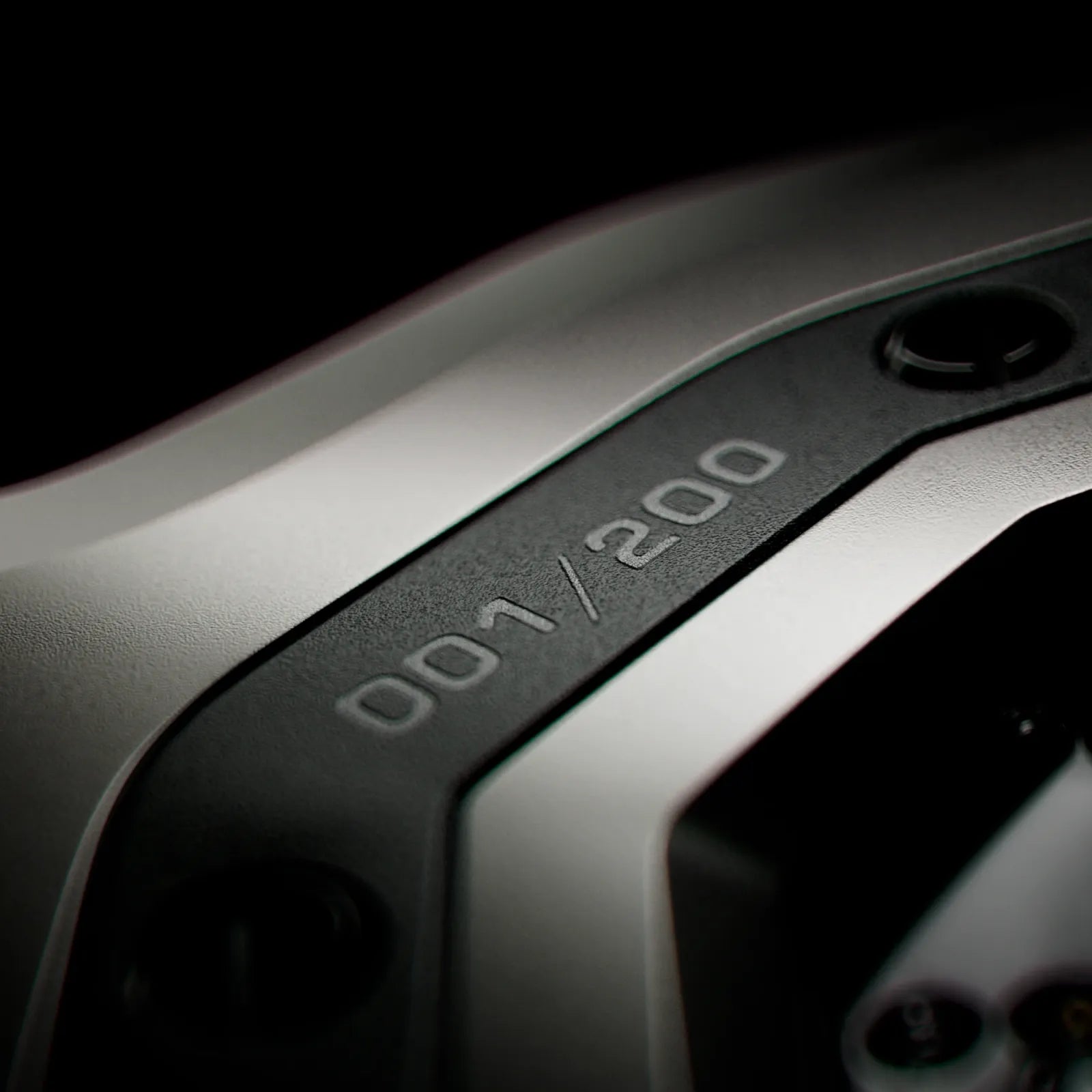 The number 001/200 engraved on the side of the AGB05 case